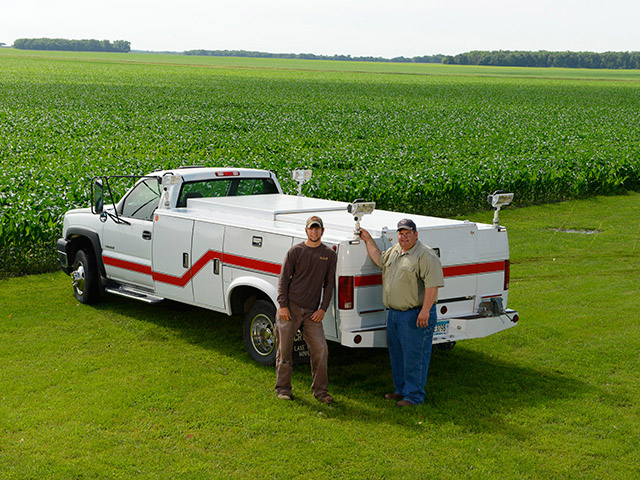 It took Andy (left) and Kevin Paap 115 days to design and build their field service truck from a used Chevy 3500. Completed over two winter seasons, they call it a bonding experience in the shop. Kevin calls it his midlife project. (DTN/The Progressive Farmer photo by Tom Dodge)